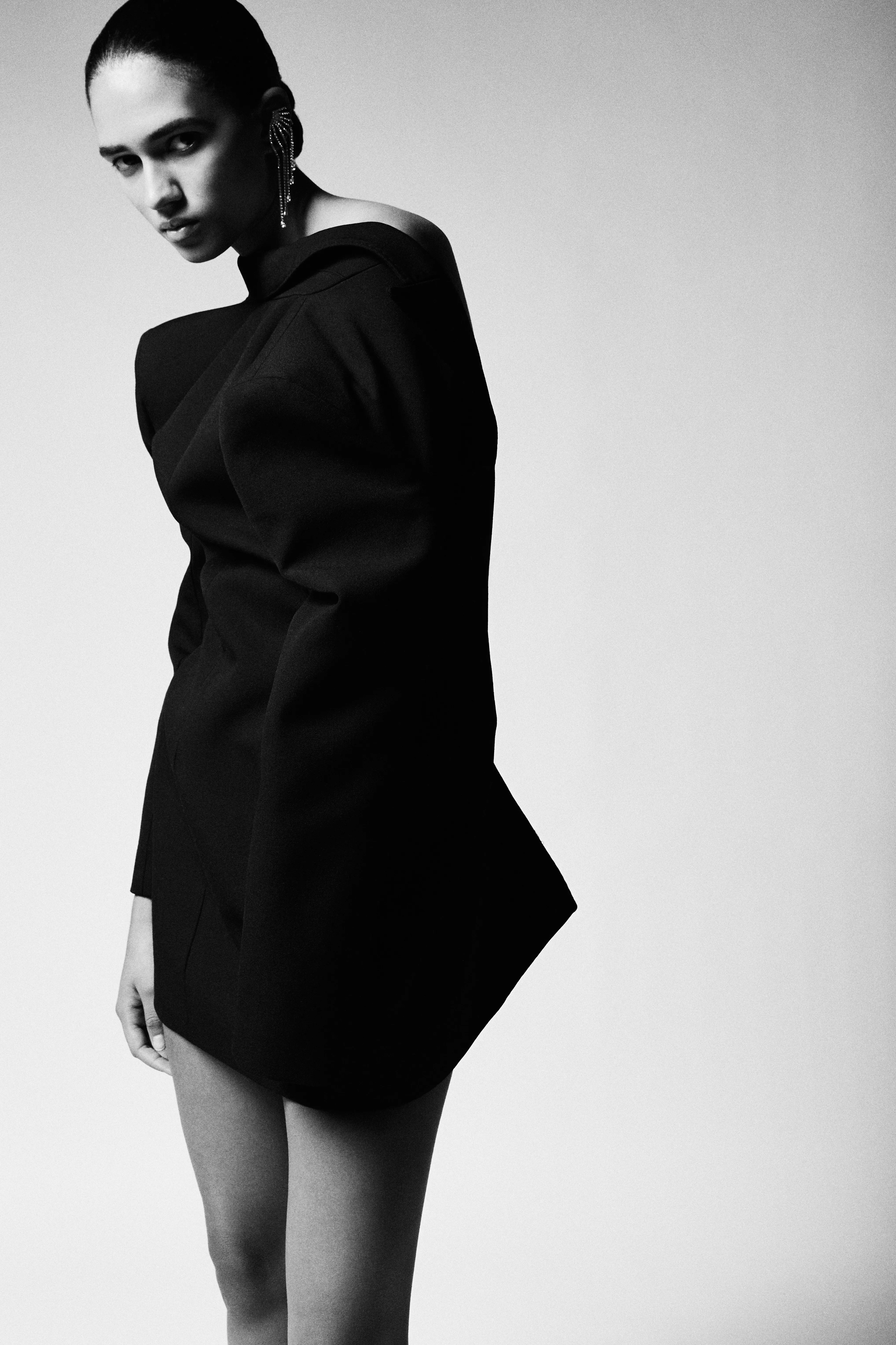 fashion editorial resilience long black figure dress